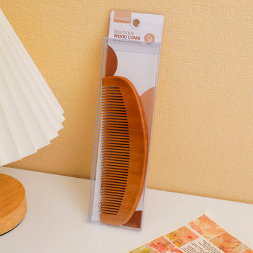 Moonshape spray-painted wooden comb with dense teeth