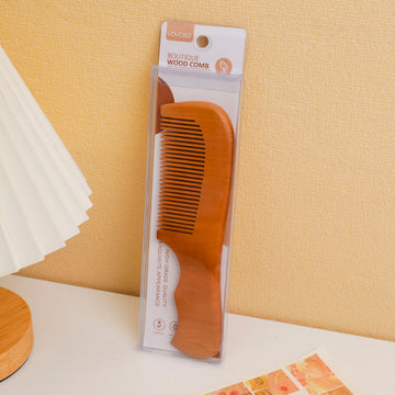 Hand section spray-painted wood comb