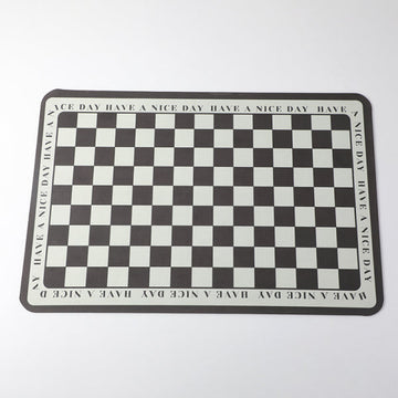 Black and white checkered absorbent floor mat
